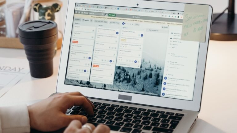 Luxury travel curator designing personalized itinerary with destination research and travel details